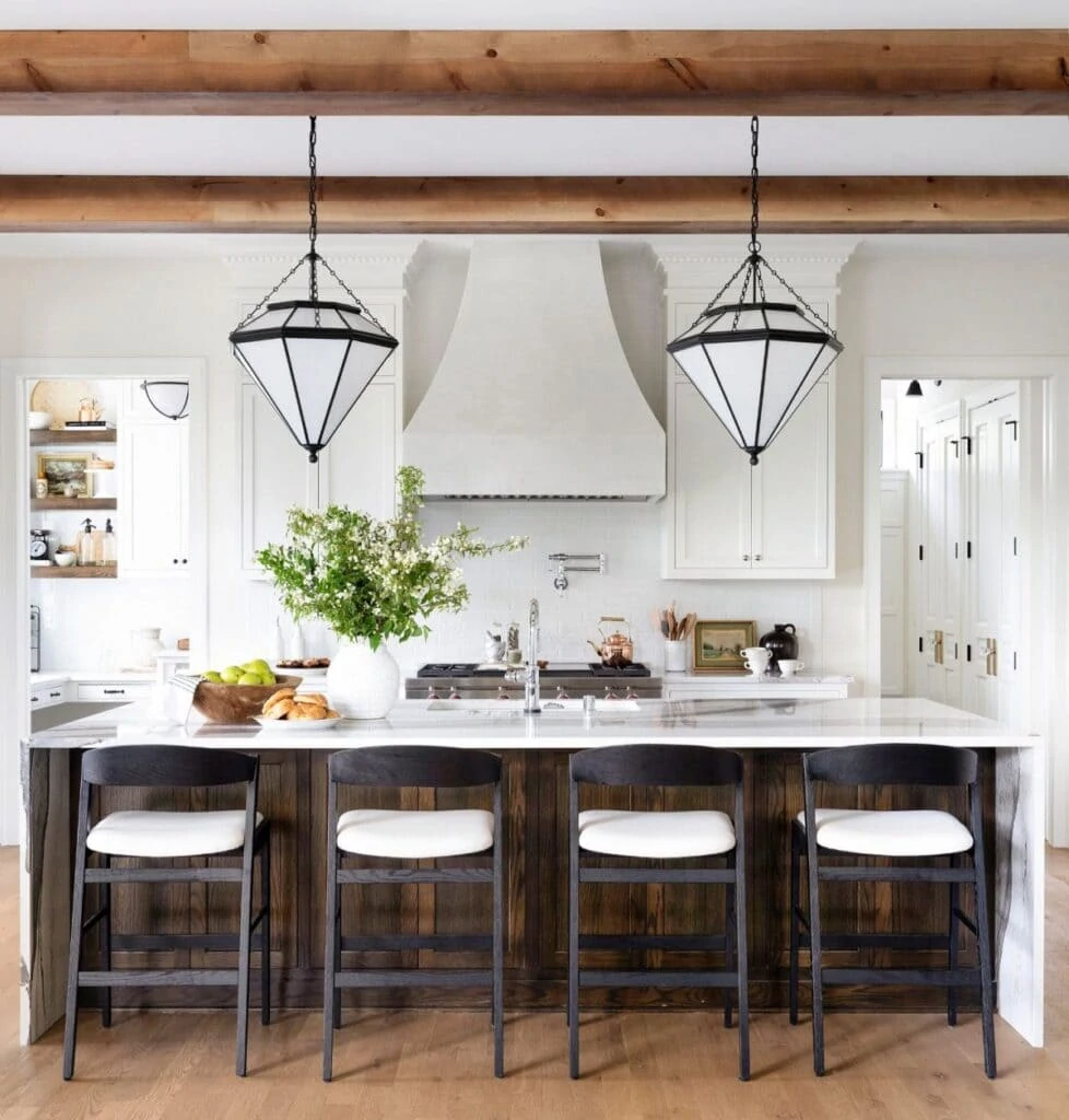 Tudor House Renovation Ideas for the kitchen. Love this walnut tone island with a white kitchen.