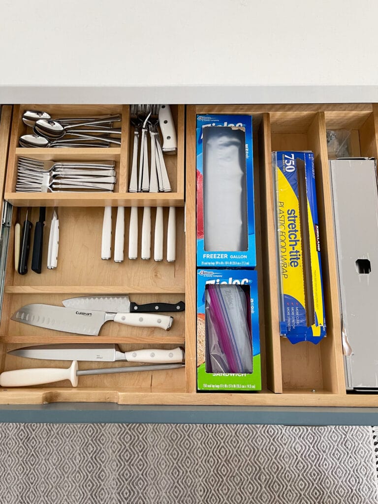 Tips on how to organize kitchen drawers, including food storage containers and lids.