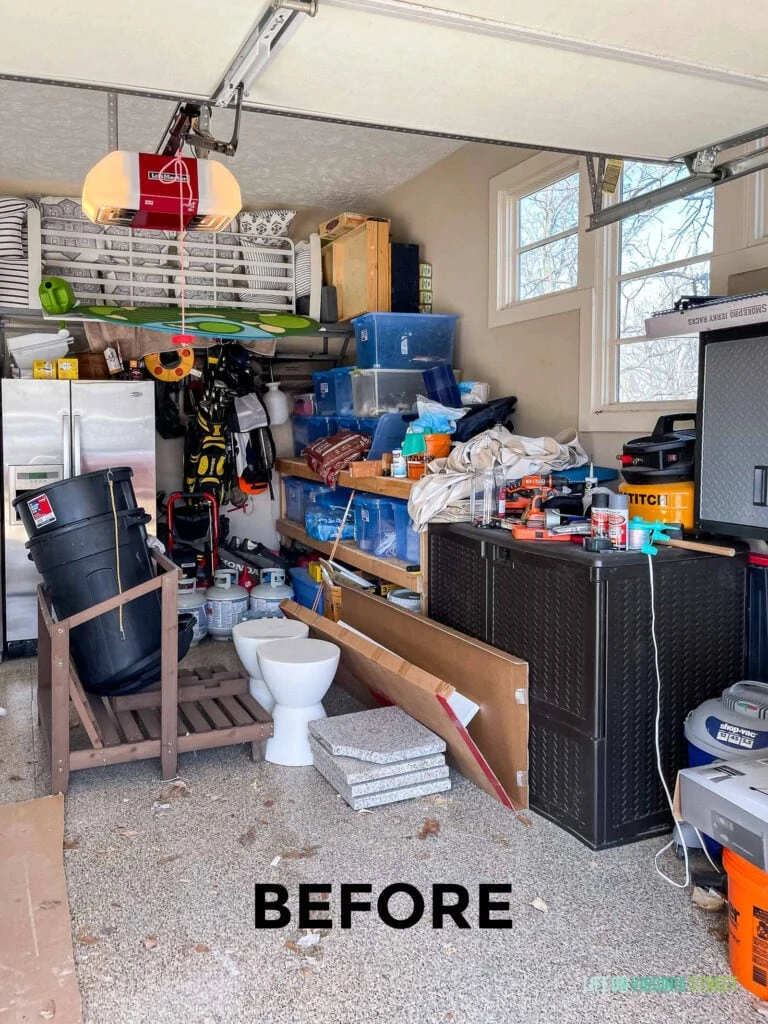 Our messy garage before we had a new garage floor coating installed and organizational pieces added.