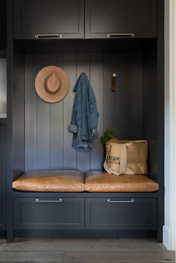 Benjamin Moore Wrought Iron mud room cabinets with leather bench cushions.