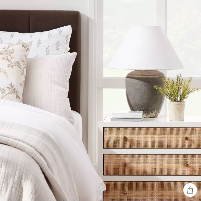 Favorites from the new Studio McGee Collection at Target for Spring 2022 including a rattan nightstand, ceramic lamp, upholstered channel headboard, and floral bedding!
