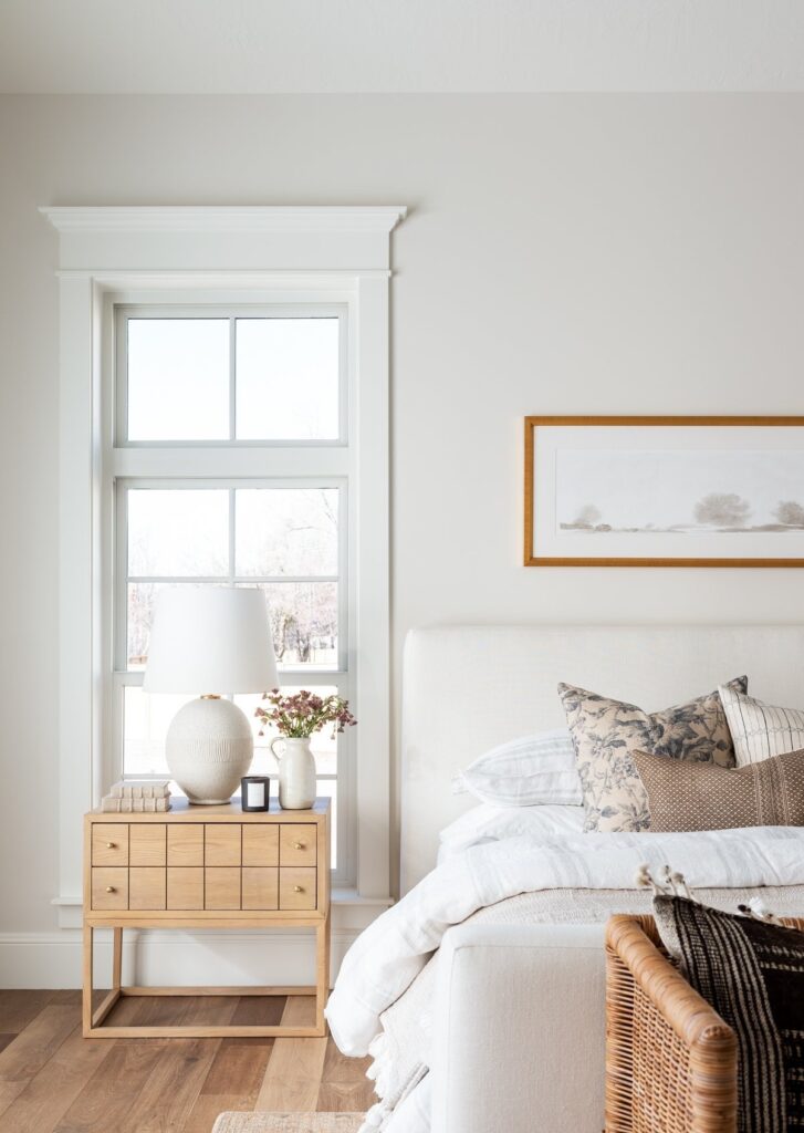 Sherwin Williams Alabaster white walls in a cozy and serene bedroom.