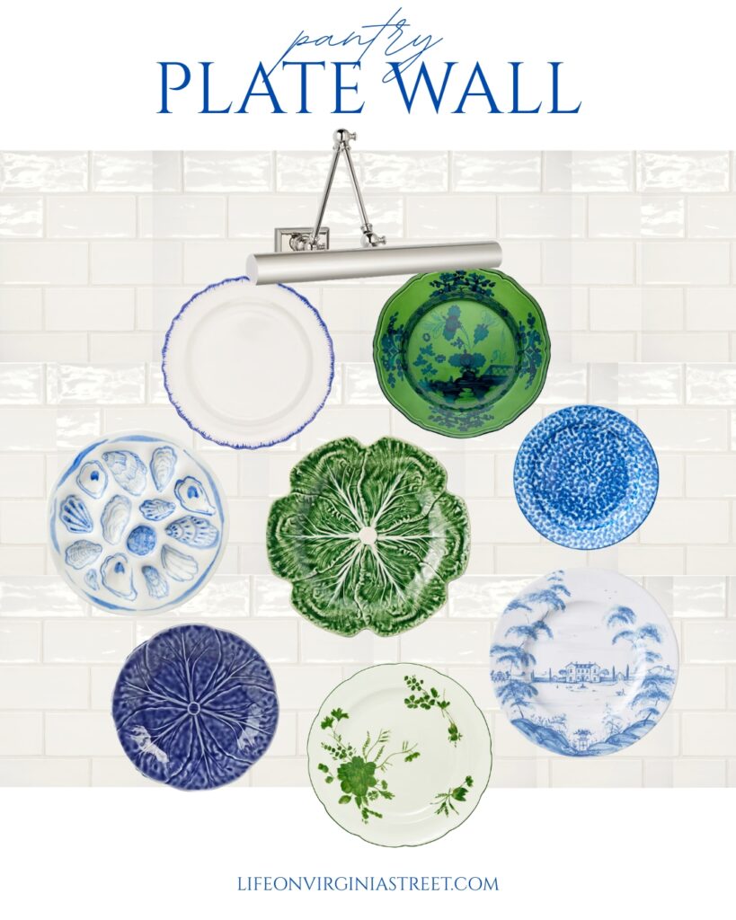A blue and green plate wall design for a kitchen pantry wall with white subway tile and a polished nickel library sconce light.